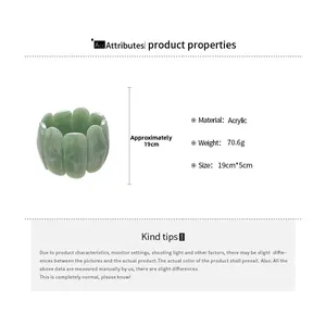 Detail view of green marble pattern acrylic cuff bracelet with dimensions 19cm by 5cm