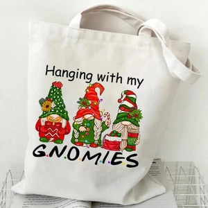 Detail of the durable canvas texture and festive gnome print on a Christmas tote bag