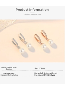 Detailed view of S925 sterling silver shell pearl hoop earrings with 19x6mm dimensions