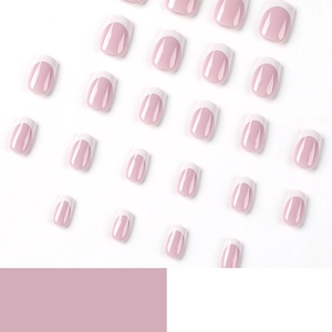 Pink nude french tip press on nails with white edges on a clean white background