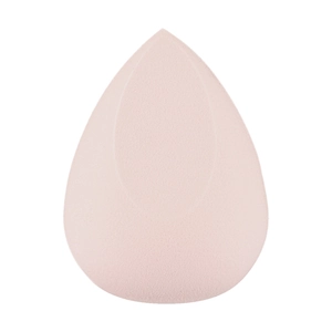 Detail of a soft peach-colored teardrop makeup sponge with a fine microporous surface