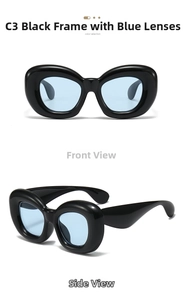 Detail view of bold black frame sunglasses with light blue translucent lenses