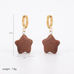 Detailed view of star-shaped hoop earrings with dimensions 3.9cm by 2cm and 7.8g weight