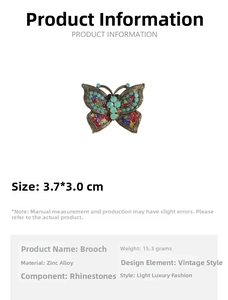 Detail view of a butterfly brooch with colorful rhinestones and 3.7x3.0cm size marks
