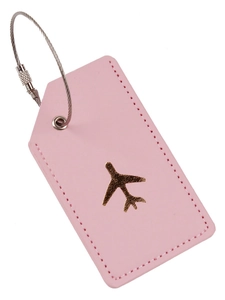 Pink leather luggage tag with gold airplane icon and steel wire loop on white background
