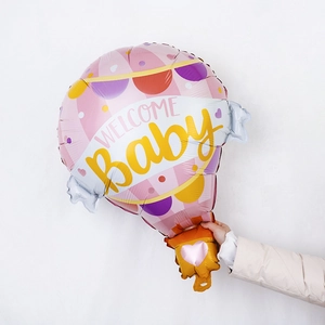 Hot air balloon foil balloon in pink and yellow with Welcome Baby text for party decor