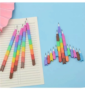 Rainbow block stackable pencil showing detachable colorful segments on blue background