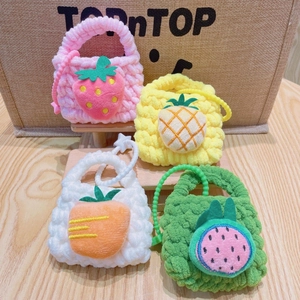 Handmade crochet fruit coin purses including strawberry, pineapple and carrot designs