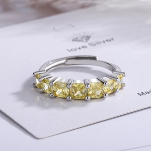 Adjustable S925 sterling silver ring featuring seven yellow square-cut cubic zirconia