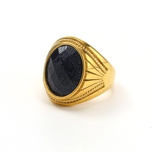 Retro gold signet ring for men featuring an oval blue sandstone with a textured band