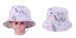 Detail of pink cotton bucket hat with unicorn print and windproof strap for kids
