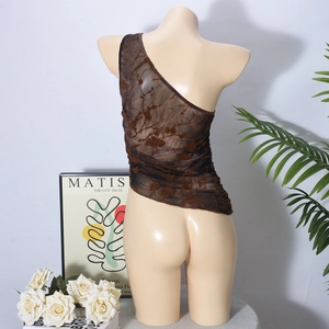 Detail of sheer brown mesh one-shoulder top with floral burnout texture and slim fit design
