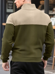 Detail of men waffle knit pullover with diamond quilted shoulders and stand collar back