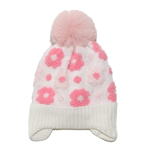 Pink knit winter hat for girls featuring 3D flowers, ear flaps and a fluffy faux fur pompom
