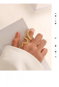 Detailed close-up of golden snake ring showing intricate scale texture and adjustable band