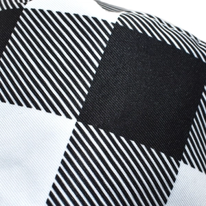 Macro shot of cotton buffalo check pattern with detailed fabric texture on bucket hat