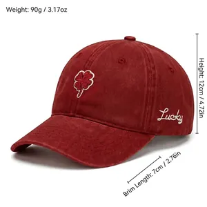 Adjustable burgundy cotton baseball cap with red clover embroidery and Lucky side detail