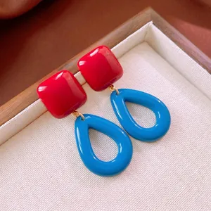 Retro square and teardrop hollow earrings in red and blue acrylic with gold accents