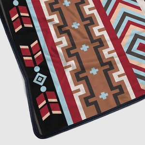 Bohemian tribal flannel blanket with geometric patterns and soft velvet texture