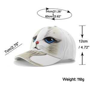 Detail showing white cotton baseball cap with hand-painted cat face and size dimensions