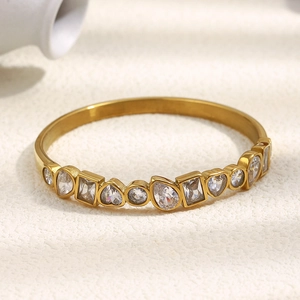 Elegant 18K gold plated stainless steel bangle with geometric zircon stones on white surface