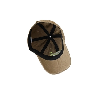 Inside view of washed cotton baseball cap with reinforced black seams and quality stitching