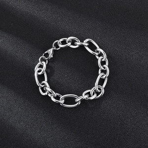 Macro shot of silver stainless steel chain link bracelet with lobster clasp on black leather