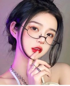 Detail of creative black metal semi-rimless glasses with a decorative heart nose bridge