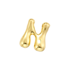Polished gold metal letter H pendant with a smooth bubble style finish on white background