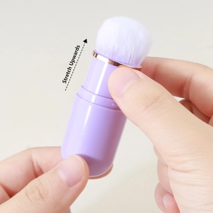 Portable retractable lavender makeup brush with dense white bristles for blush and powder
