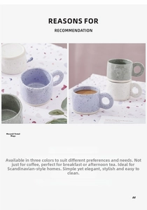 Detailed view of hand-pinched ceramic mugs with black ink splatter in Morandi colors