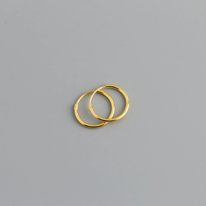 Minimalist gold hoop earrings in S925 sterling silver with a smooth polished finish