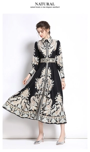 Detail of vintage paisley print and belted high waist on a black long sleeve shirt dress