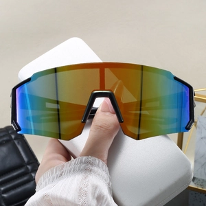 Detail of colorful polarized lenses and matte black frame on sports cycling sunglasses