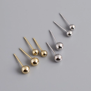 Detail view of gold and silver S925 sterling silver bead earrings in multiple sizes