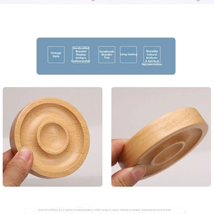 Detail view of round wooden display tray for bracelets with dual concentric grooves