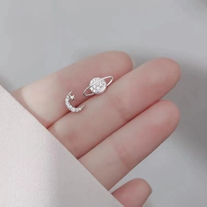 925 Sterling Silver asymmetrical moon and star stud earrings with sparkling cubic zirconia