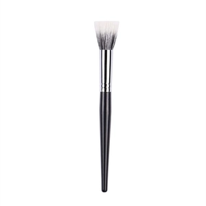 Macro detail of high-quality foundation brush with black and white gradient soft bristles