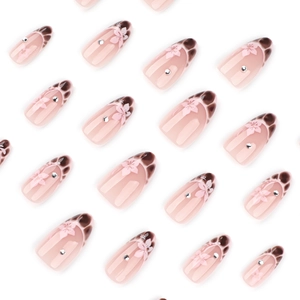 French brown leopard press-on nails with pink floral accents and crystals in almond shape