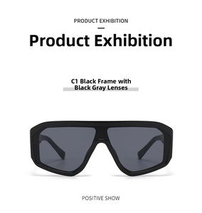 Front view of oversized wrap-around sunglasses with black frames and dark grey lenses