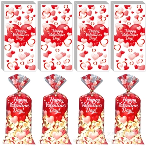 Detail of Valentine's Day OPP gift bags with red hearts and popcorn snacks