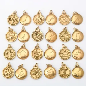 Golden 12 zodiac constellation coin pendants with embossed motifs and star charts
