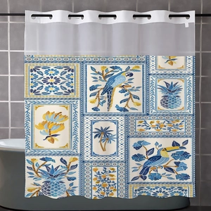Detail of waffle weave shower curtain with blue macaw and tropical Mediterranean tile pattern