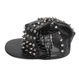 Punk style black faux crocodile leather snapback hat with silver metal spikes and flat brim