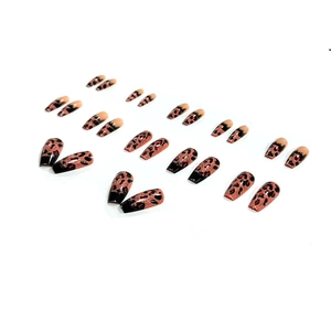 Long leopard print press-on nails with black tip gradient design for a sexy look