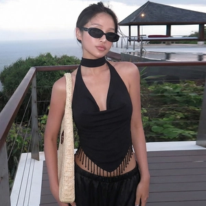 Detail of black halter top with tassel bead trim and matching choker accessory