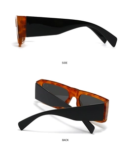 Side and back view of oversized tortoise frame sunglasses with thick black temples
