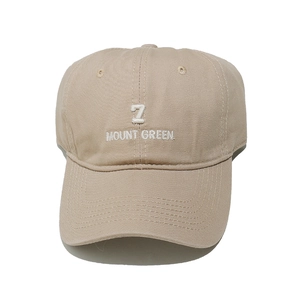 Detail of khaki twill cotton baseball cap with number 7 and Mount Green embroidery
