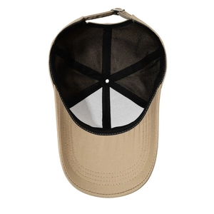 Khaki cotton baseball cap interior detail showing six-panel design and metal buckle