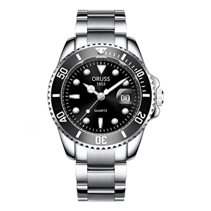 Close-up of silver stainless steel diving watch with black dial and luminous markers